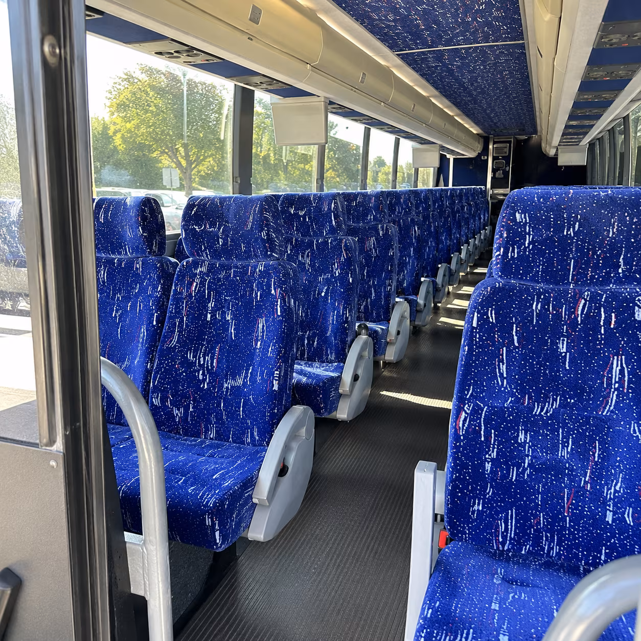 reading 50 passenger charter bus inside
